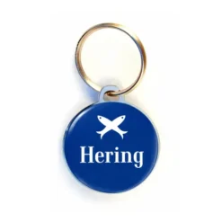 Chaveiro personalizado promocional com acabamento em adesivo resinado redondo